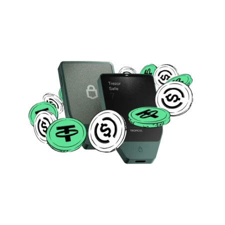 Trezor hardware wallet surrounded by various cryptocurrency coins on dark background.